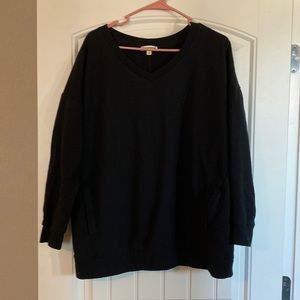 Never worn. Black sweatshirt. It has pockets!